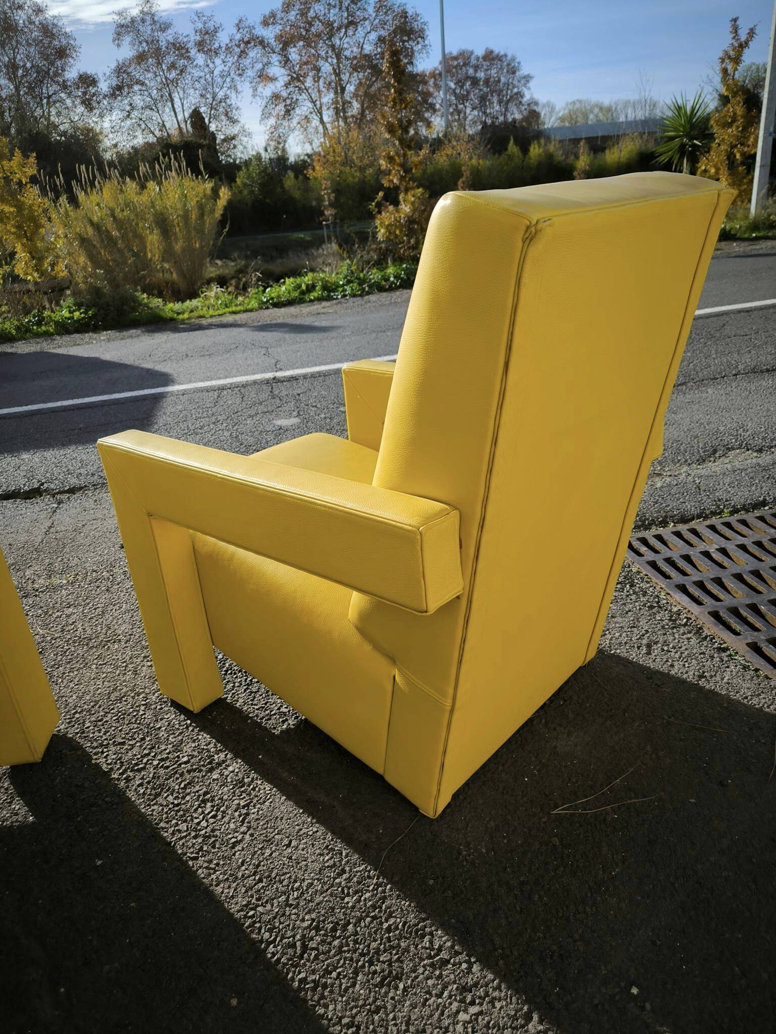 Pair of armchairs in sunny yellow leather