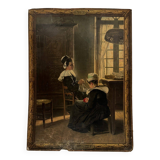 Sign read on cardboard illustrated with two Breton women in costume