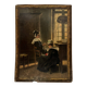 Sign read on cardboard illustrated with two Breton women in costume