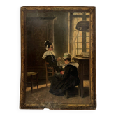 Sign read on cardboard illustrated with two Breton women in costume