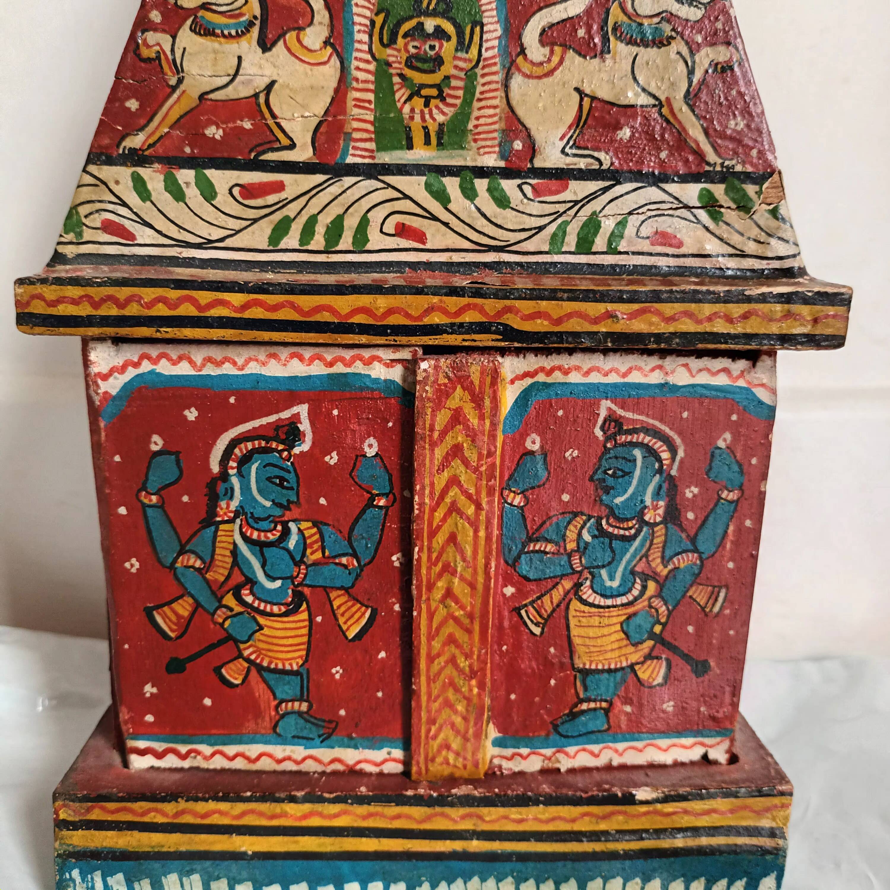 Indian temple made of hand-painted wood