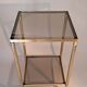 Gilded brass and smoked glass end table, 1960s.