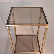 Gilded brass and smoked glass end table, 1960s.