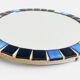 Round mosaic mirror in the style of Vallauris, France circa 1970.