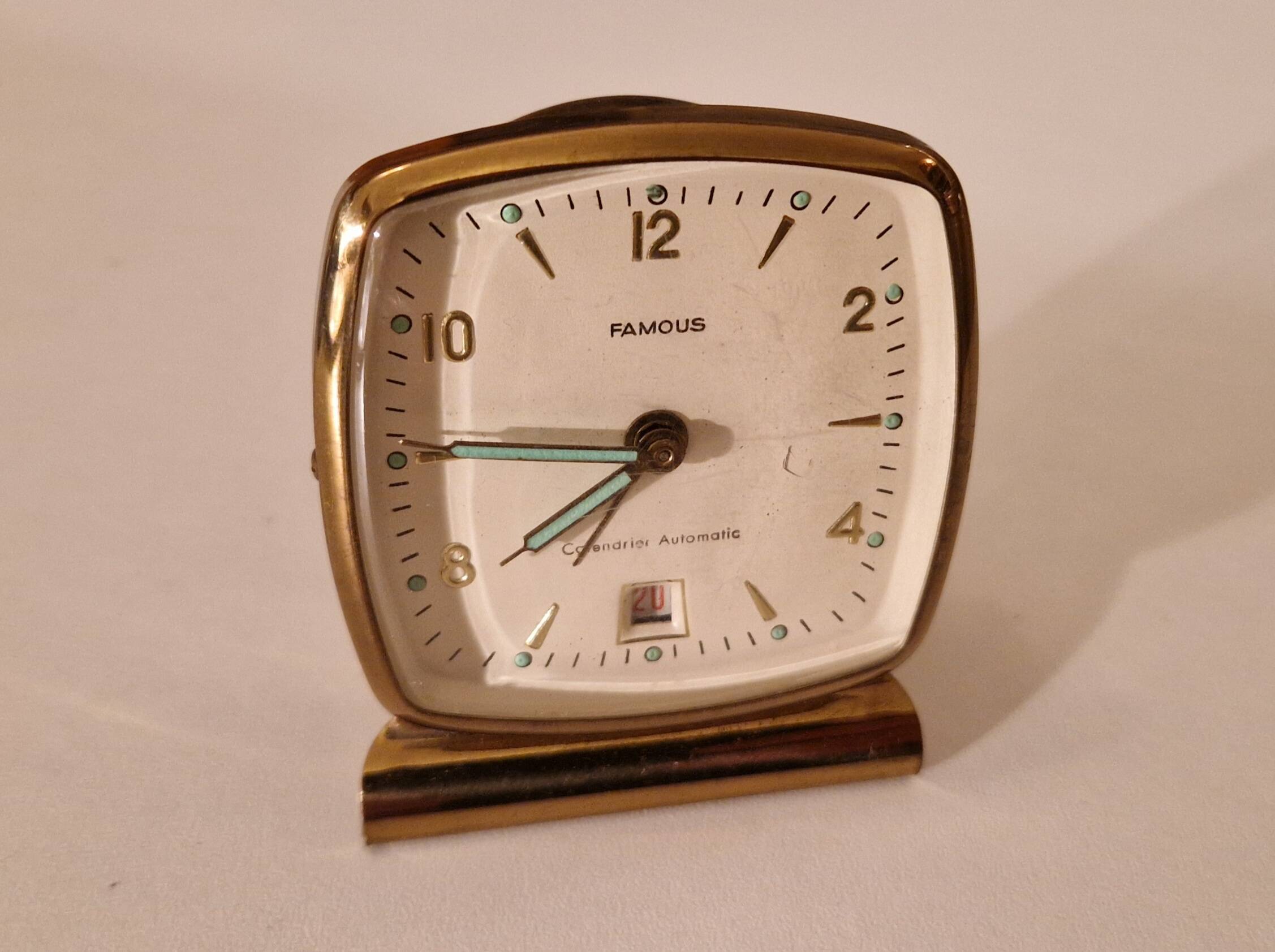 "Famous" alarm clock, automatic calendar model, vintage circa 1950, perfect condition