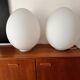 Two opal glass egg lamps