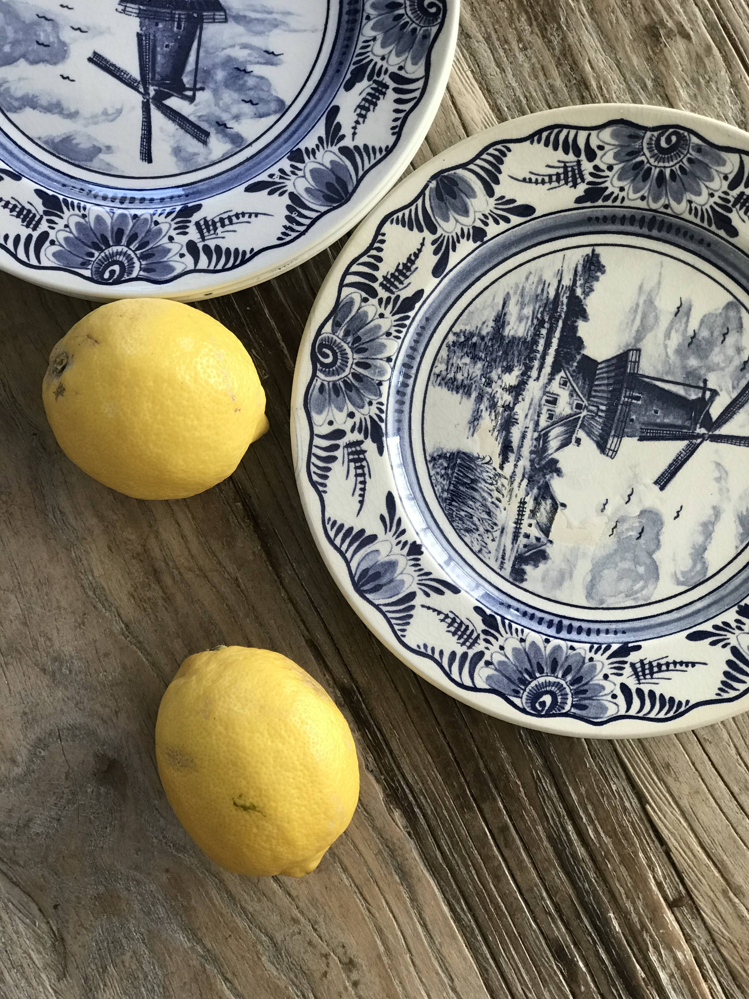 Lot of 4 dessert plates in white porcelain and Dutch mill design