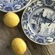 Lot of 4 dessert plates in white porcelain and Dutch mill design