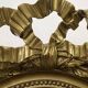 Antique oval gilded mirror – Louis XVI style with ribbon bow