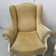 Pair of Louis XV style wing chairs in patinated beech, 20th century