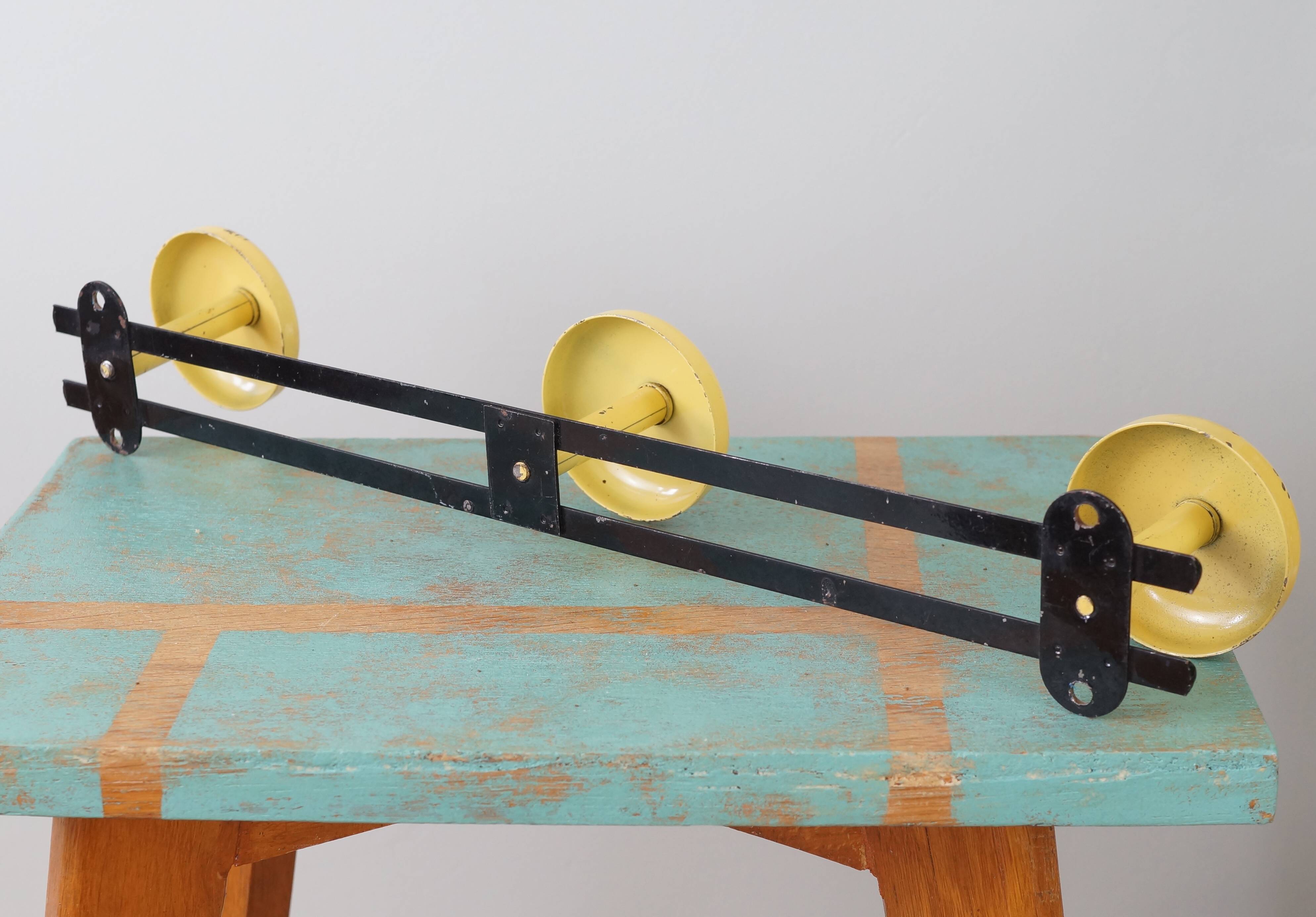 Yellow and black enamelled metal hook, 60s