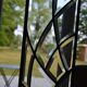 Deux vitraux en verre biseauté et laiton