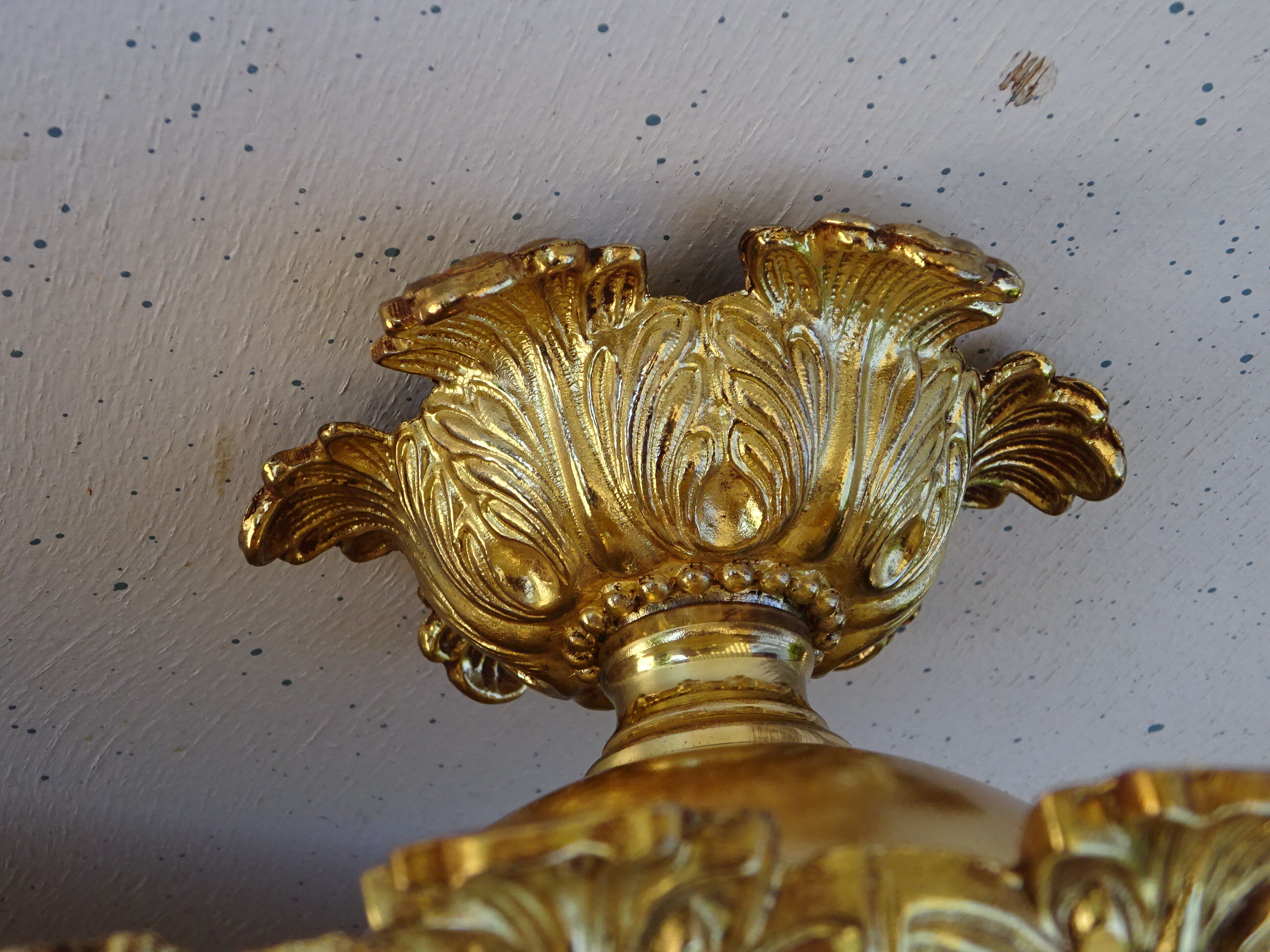 Glass and brass globe chandelier