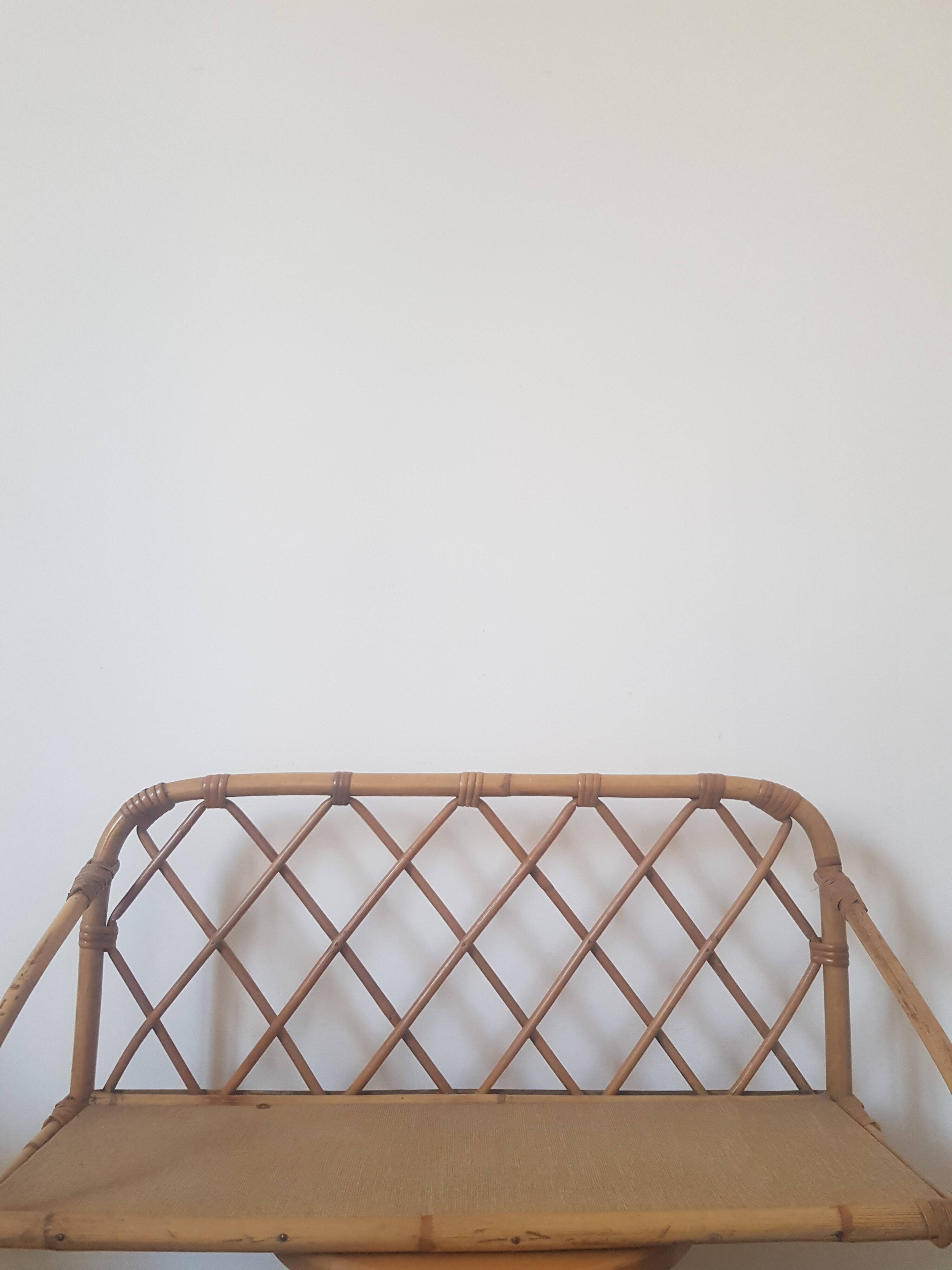 Rattan wall shelf