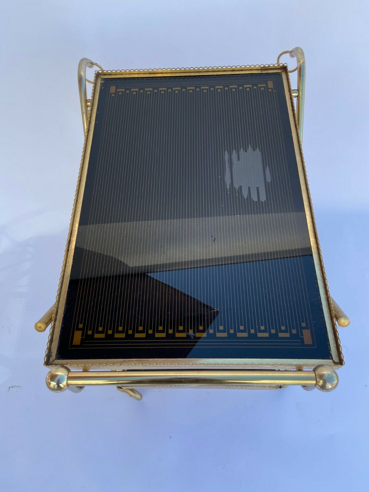 Vintage 1960's bar rolling table smoked glass gilded metal