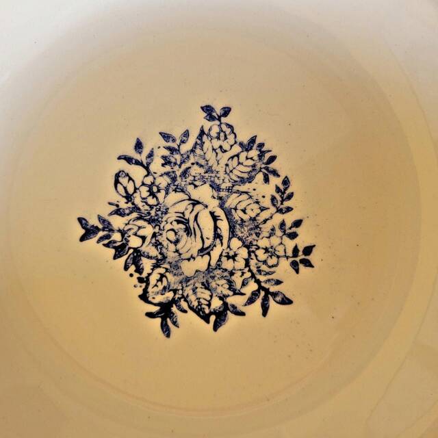 Vintage deep plates in ADP earthenware, blue rose patterns.