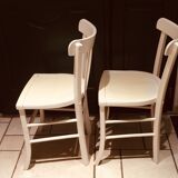 Pair of painted white bistro chairs
