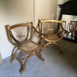 Paire de fauteuils dorés cannés