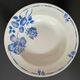 Set of 9 vintage deep plates with blue patterns.