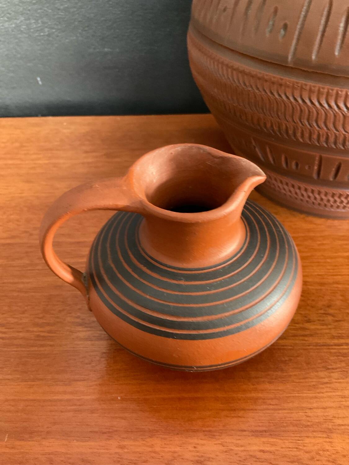 Trio of vintage vases in chiselled terracotta