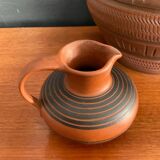Trio of vintage vases in chiselled terracotta