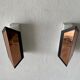 Pair of French wall lights with geometric design in copper, 1960, France.