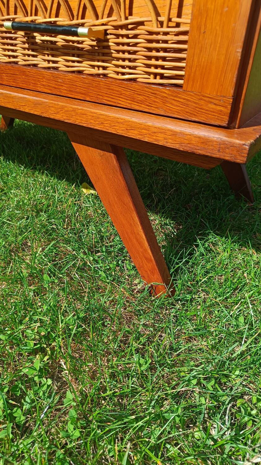 Rattan and wood splayed-leg chest of drawers