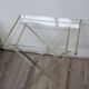 Folding side table in plexiglass and brass, 1970s.