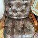 1970s Scandinavian armchair in curved laminated wood with a leather seat.
