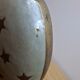 Small vintage soliflore vase in white enamelled brass with golden stars.