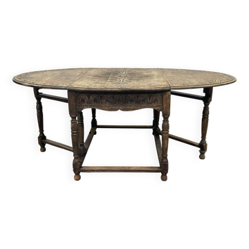 English oak drop-leaf table from the early 20th century