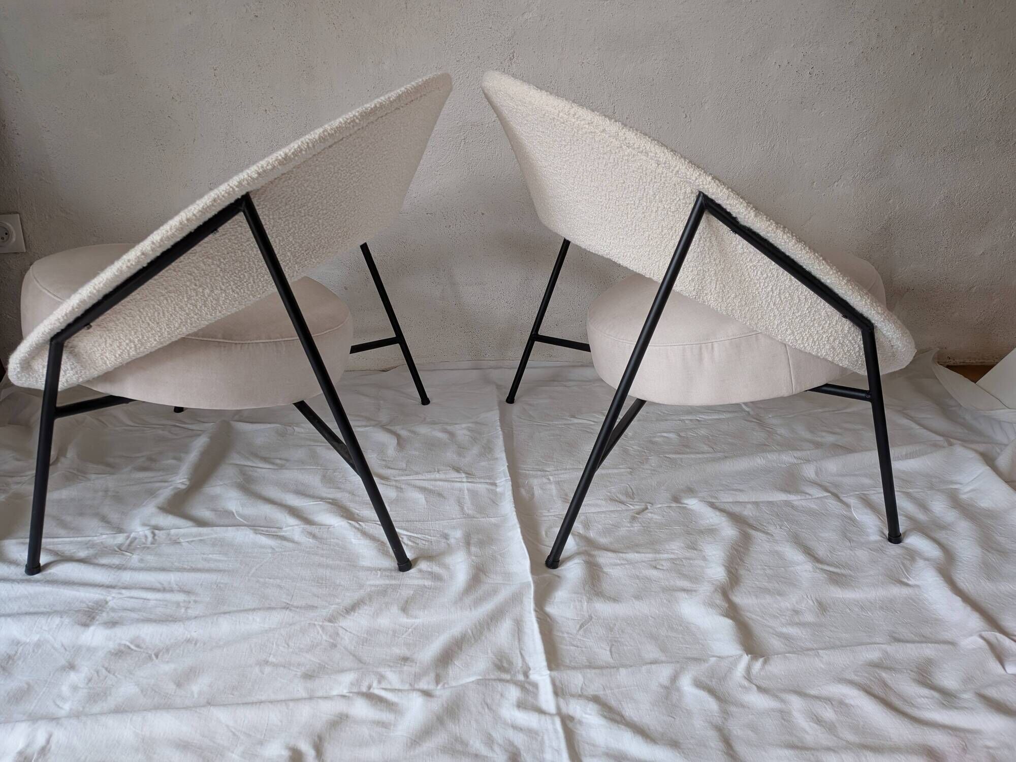 Pair of Saturn armchairs by Geneviève Dangles and Christian Defrance.