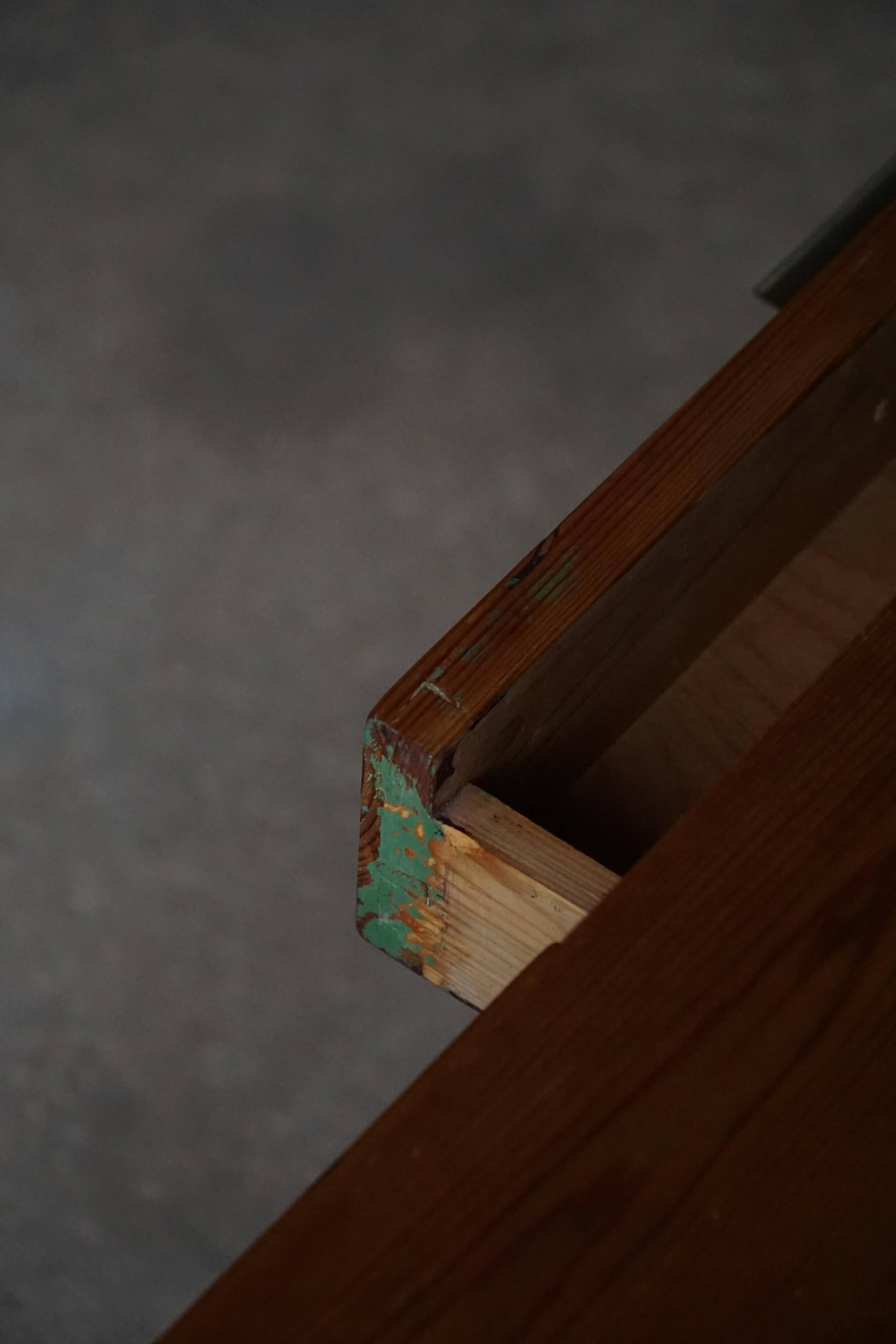 Mid-20th century Art Deco chest of drawers in pine with metal handles, 1940s.
