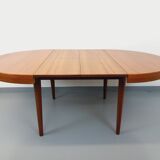 Large vintage Scandinavian round table from the 50s 60s in teak with extensions