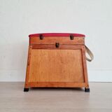 Old fisherman's stool with red seat
