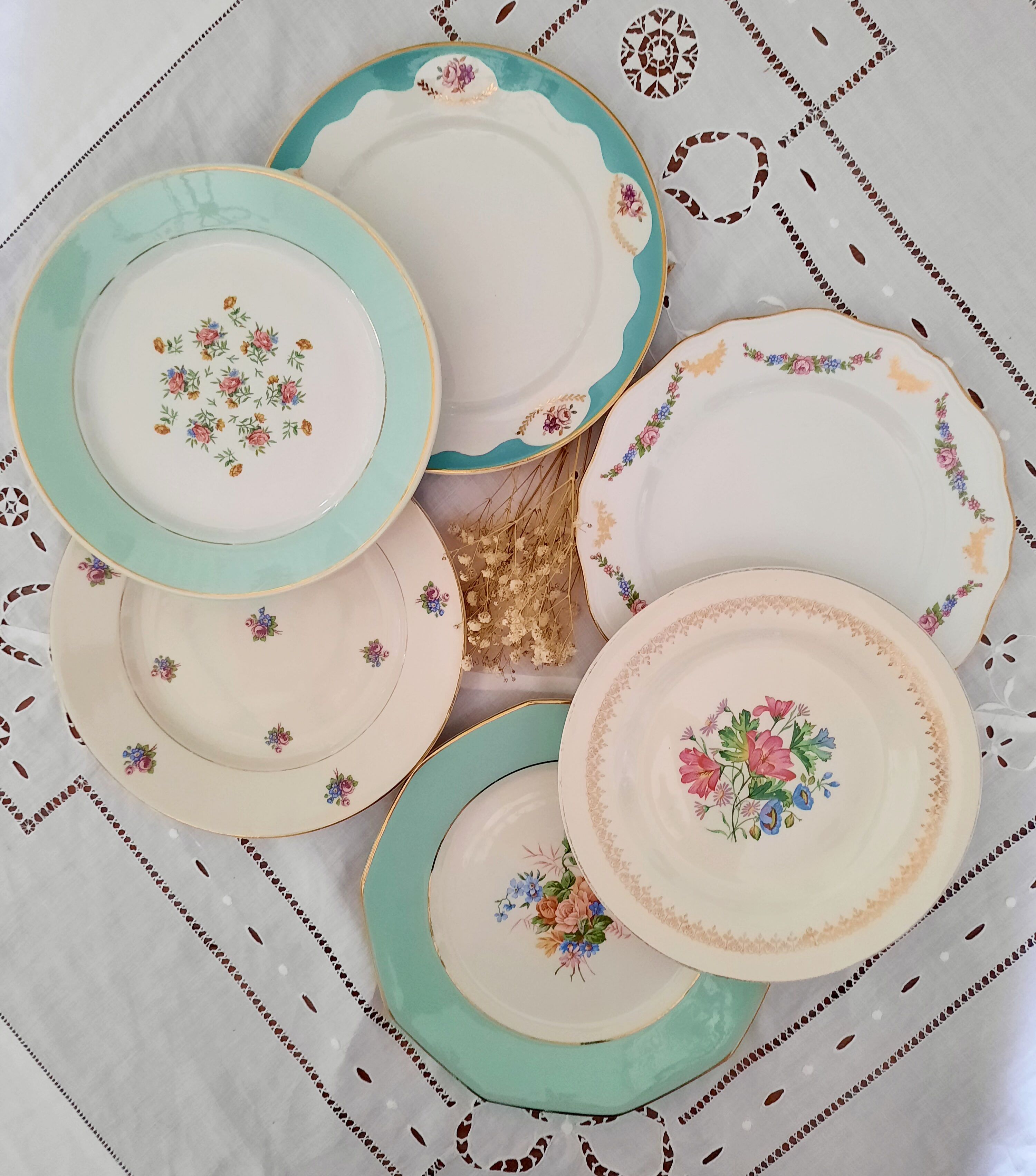 Mismatched old flat plates with gold