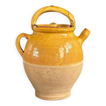 Ancient oil jar in glazed terracotta