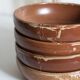 Set of 4 plates in sandstone of Saint Amand signed