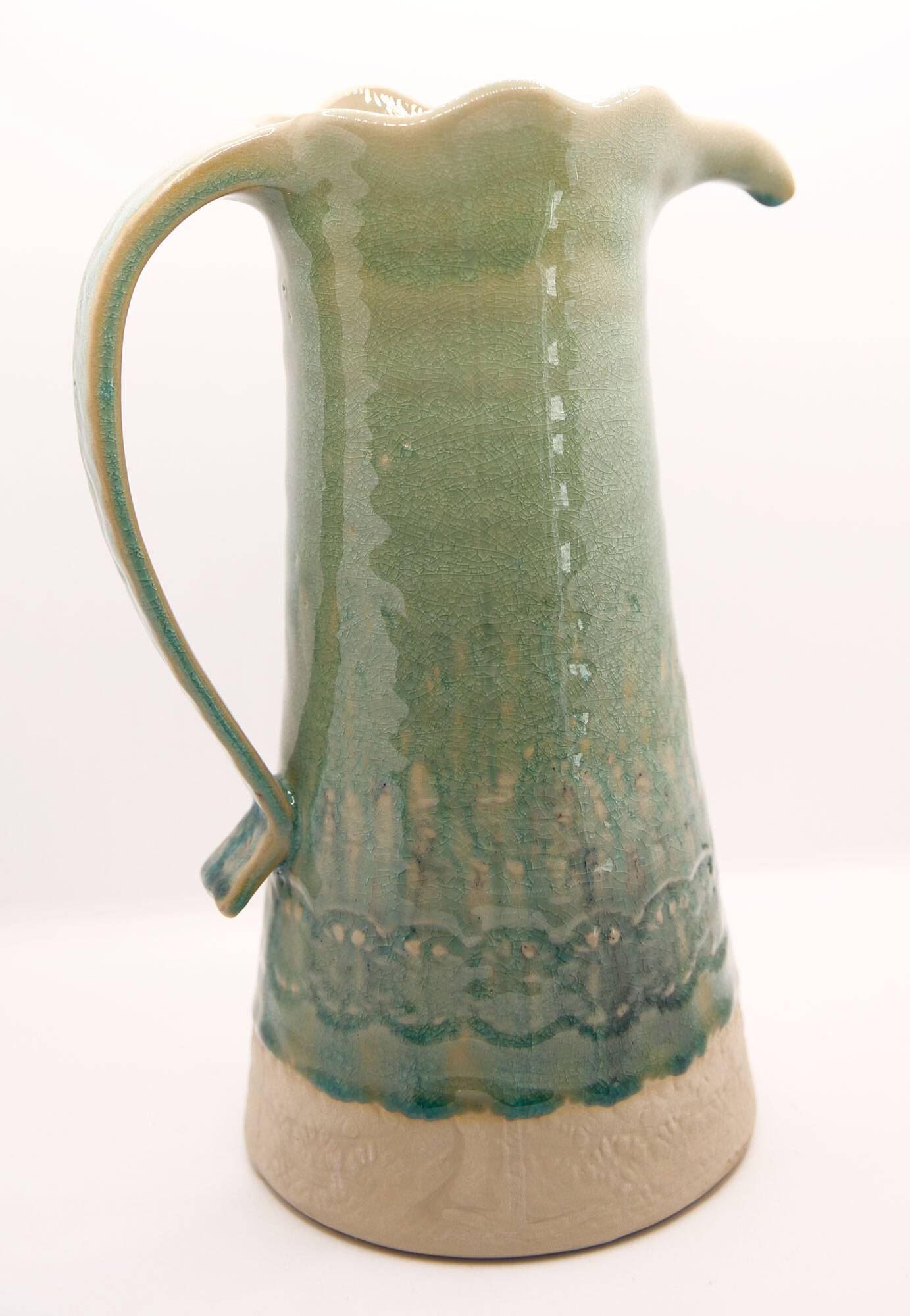 Handcrafted XL pitcher in mint green enameled stoneware