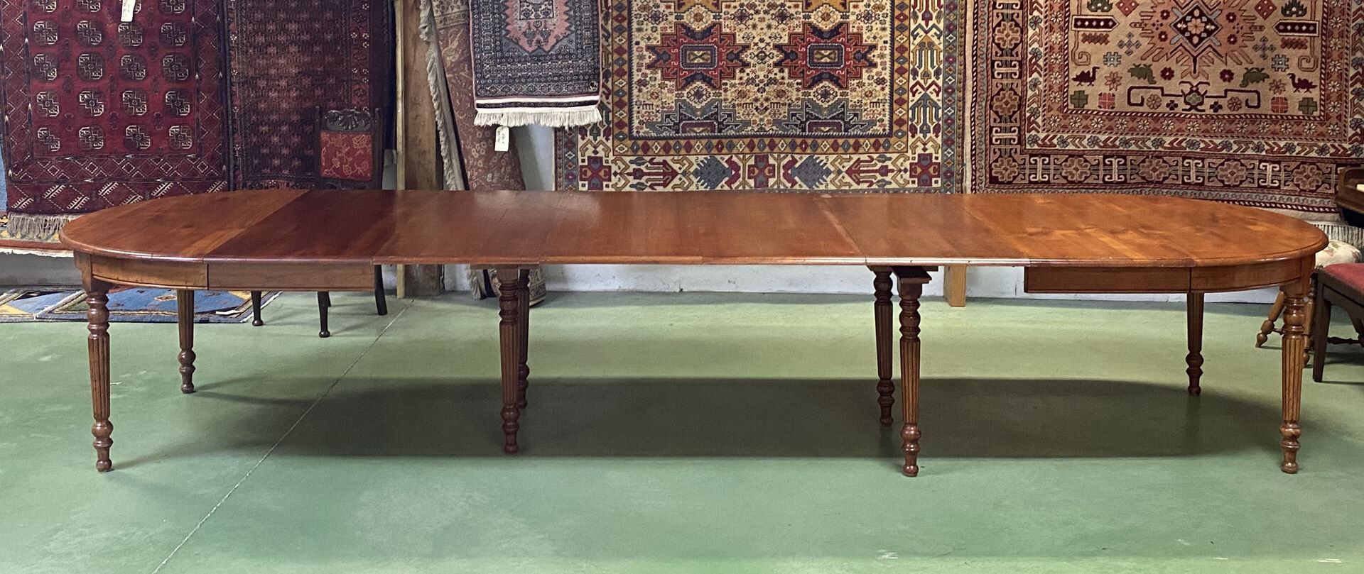 Louis Philippe round table 8 feet in cherry with 6 extensions