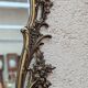 Gold metal wall mirror