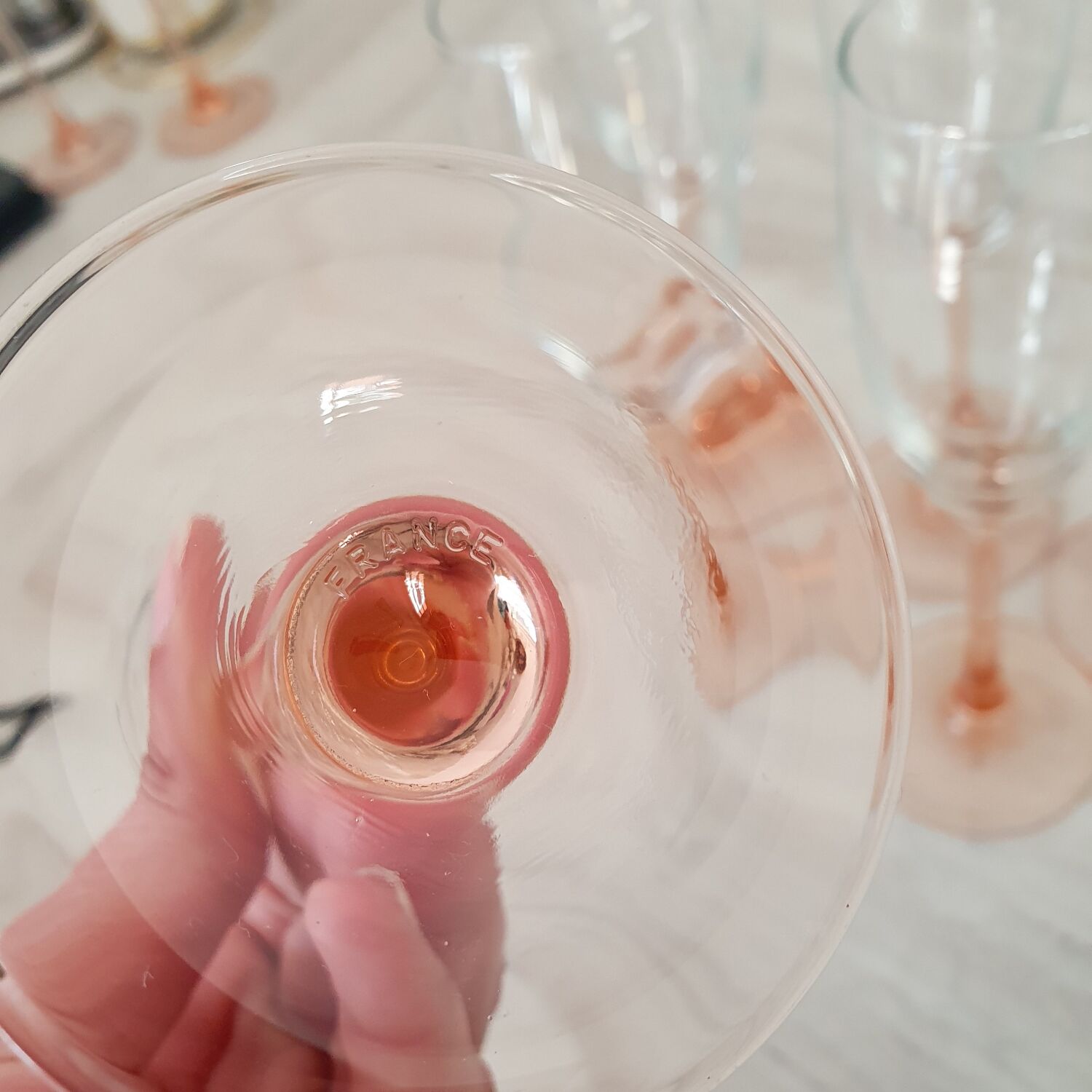 6 champagne flutes with pink stems