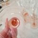 6 champagne flutes with pink stems