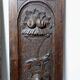 Pair of decorative wall panels in carved wood from the 19th century.