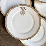 6 flat plates in gold porcelain monogrammed "F"