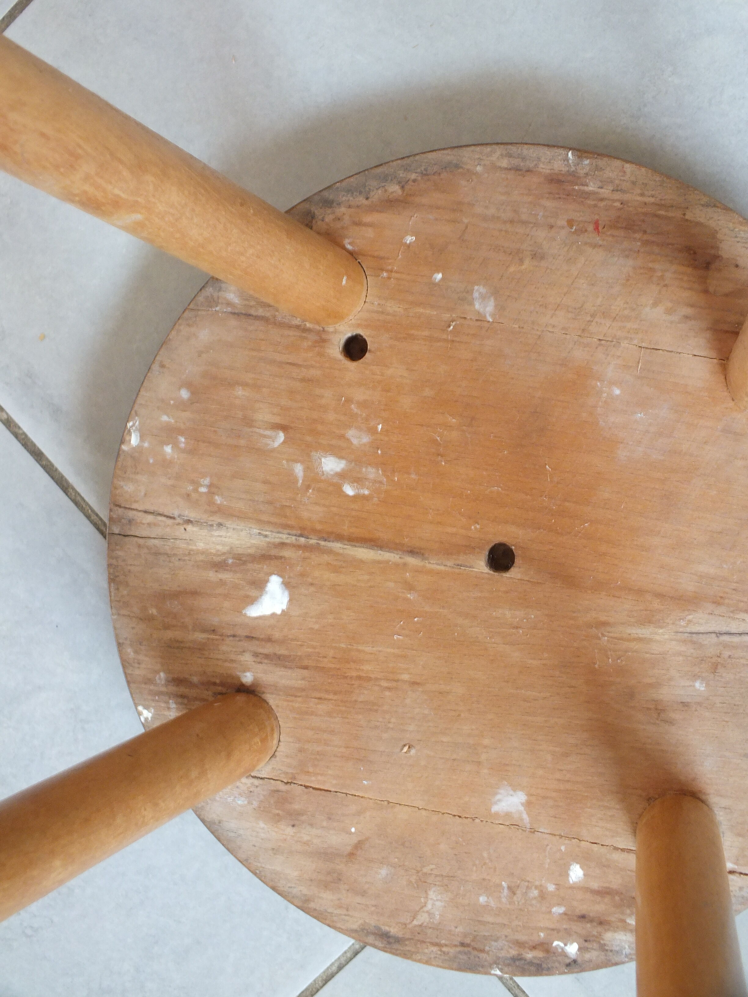 Vintage stool in patinated natural wood