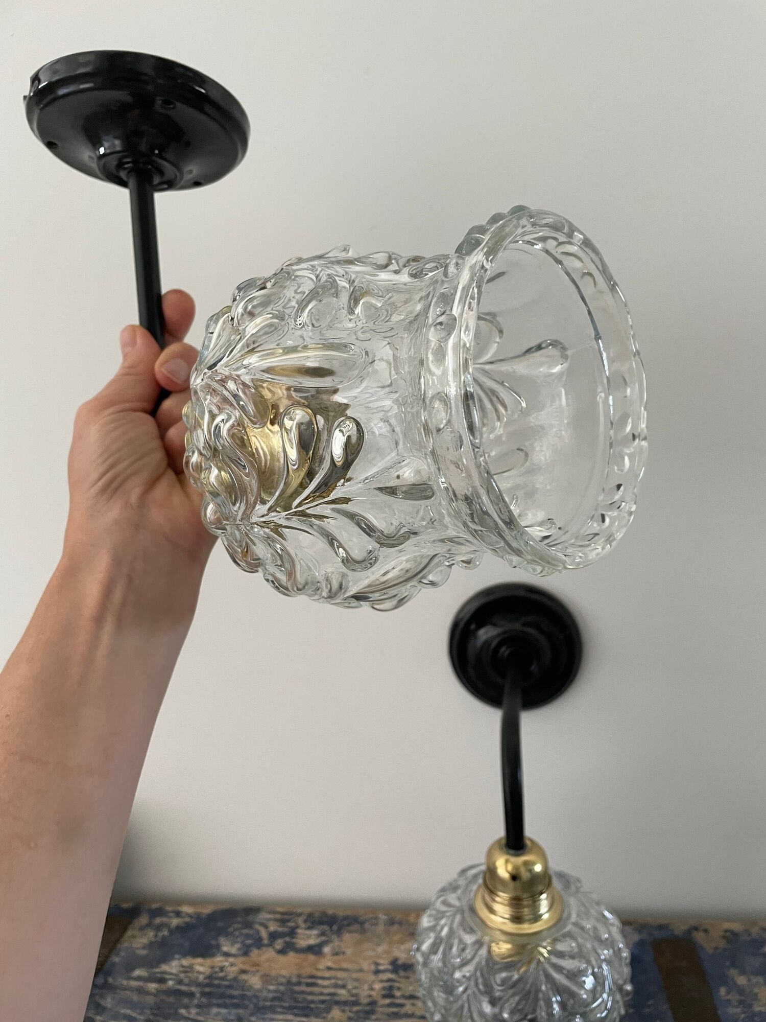 Pair of vintage electrified to nine-piece chiseled glass wall lamps