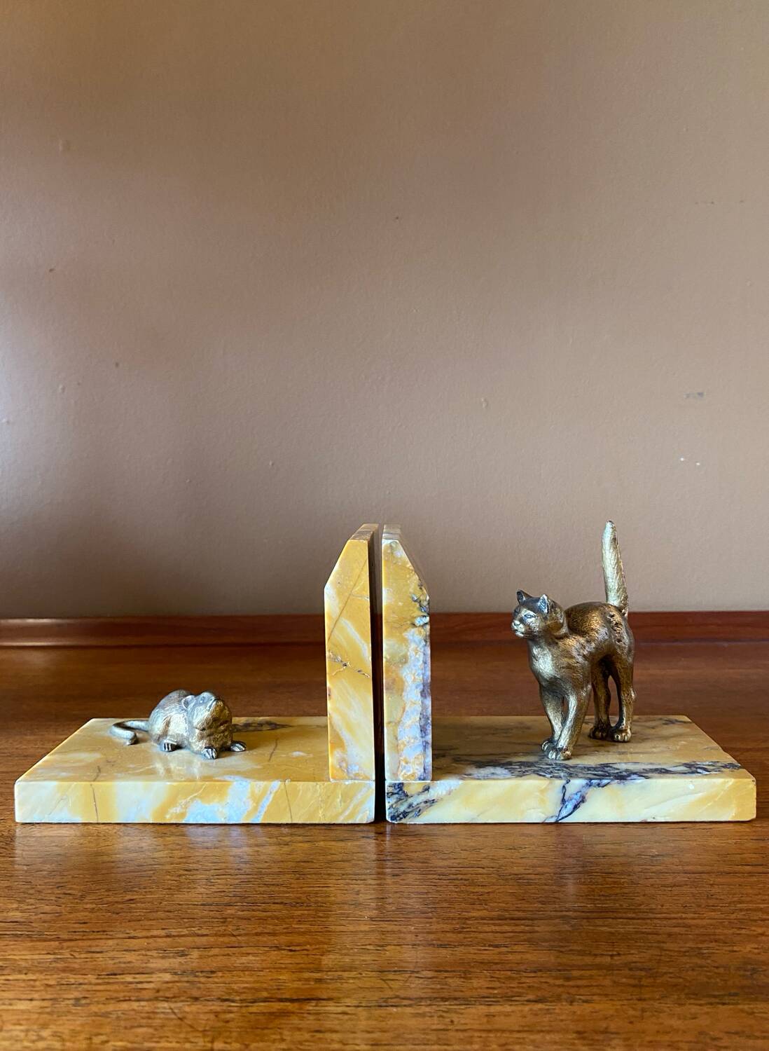 Art deco bookends by Jean Garnier, bronze and marble.