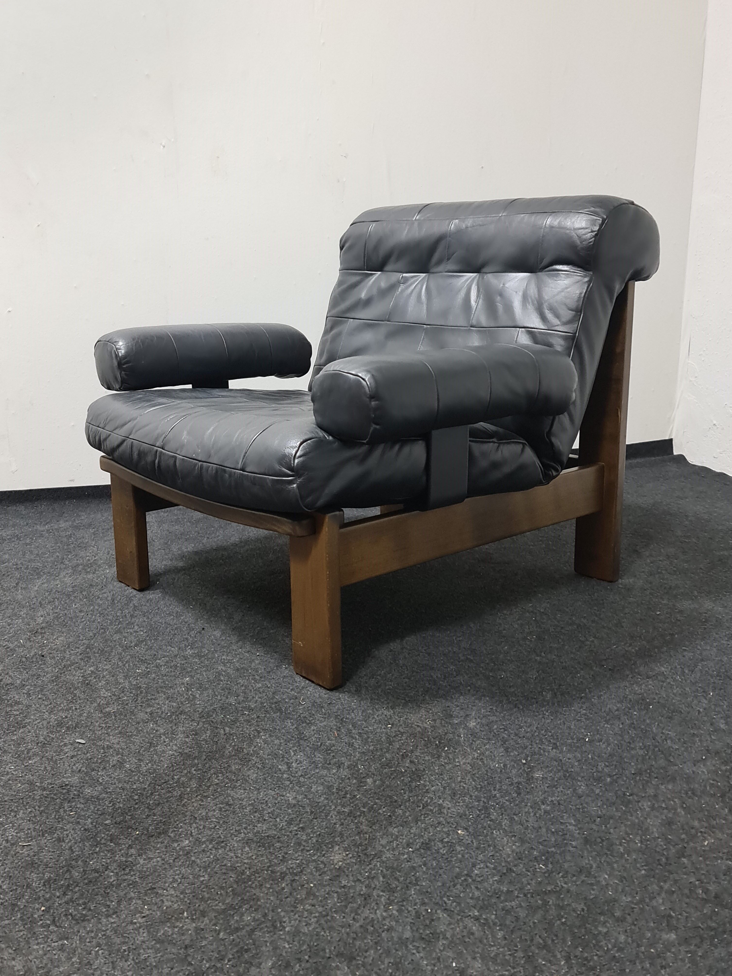Vintage black leather patchwork and oak lounge chair