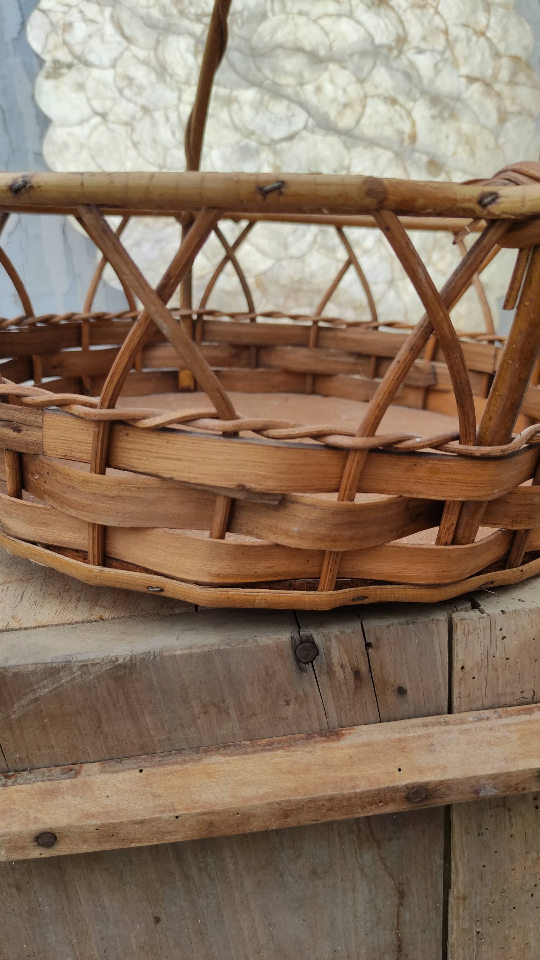 Vintage basket made of wood and rattan